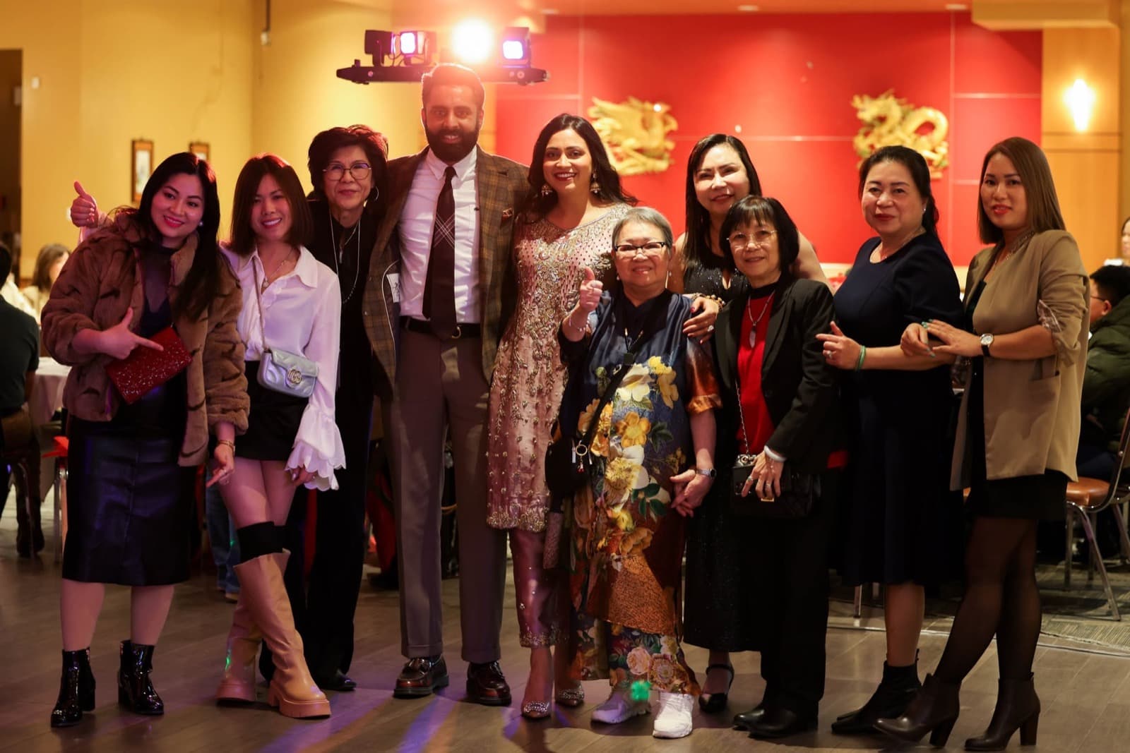 Guests gathered for a photograph in the banquet hall.